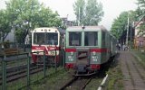 Die Triebwagen MBd1-133 Richtung Lisewo und  MBxd2-212 Richtung Malbork Ka�dowo in Nowy Dw�r Gda�ski (Tiegenhof) am 08. September 1992